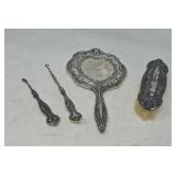 Victorian hand mirror and brush.