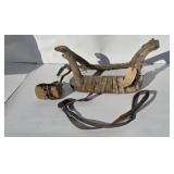 Cheyenne wood frame saddle covered with rawhide