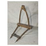 Primitive wood yoke calf weiner.