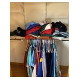 All clothing in closet womenï¿½s and menï¿½s shirts
