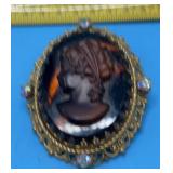 Vtg Brooch. Features a molded tortoise shell