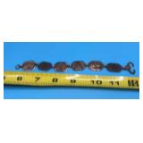 Copper Link Bracelet. Features stamped panels