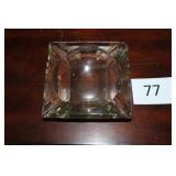 Vintage glass ashtray with chip