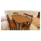 Anderson  Bro  Dining table with 6 chairs.
