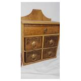 Oak cabinet made out of treadle sewing machine