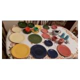 Fiesta ware dishes  some chipped.
