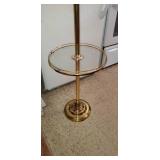 Brass floor lamp.