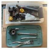 Plastic Storage Bin and Green Tray Containing a