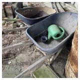 Two Wheel Barrows with Flat Tires and Feed