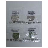 4  Kennedy Half Dollars Uncirculated