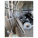 All Tires, Wood, Pump, and More Along Wall