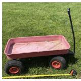 Red Wagon with Four Flat Tires