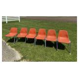 Six Plastic Stacking Chairs