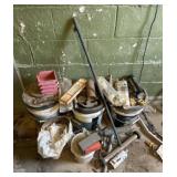 Empty John Deere Oil Cans, Clamps, and More