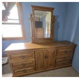 Honey Oak Dresser with an Attached Mirror
