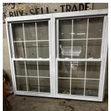 White vinyl double-hung window,