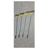 Four brooms