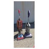 Two Upright vacuum cleaners both work