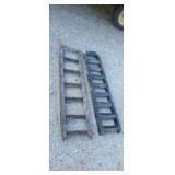 2  steel trailer ramps.