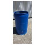 55 gallon plastic drum top cut out of it.
