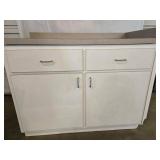 White formica base cabinet