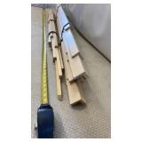 2-bundles of wood trim or framing materials