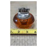 Viking Glass orb tabletop lighter in a striking