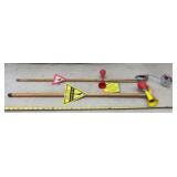 Novelty walking canes featuring decorations like