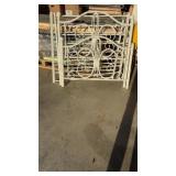 Victorian cast metal twin bed frame featuring an