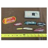 Small Advertisement Knives and Exxon Mobil