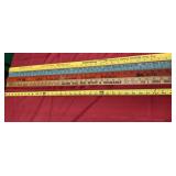 Four Advertising Yard Sticks