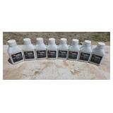 Eight bottles of 2-cycle oil
