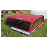Fiberglass pickup camper shell for a full size