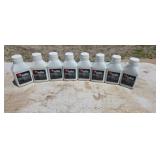 Eight bottles of two cycle oil