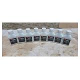 Eight bottles of 2-stroke oil