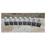 Eight bottles of two cycle oil