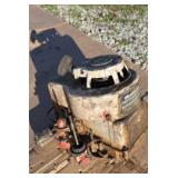 Older Briggs & Stratton lawn mower motor running