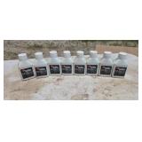 Eight bottles of 2-stroke oil