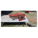 Shindaiwa 500 chainsaw with case for repair or