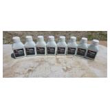 Eight bottles of two-cycle oil