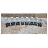 Eight bottles of 2-cycle oil
