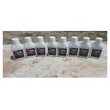 Eight bottles of two cycle oil