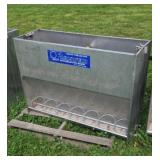 42"W X 29 1/2" T stainless steel sow feeder.