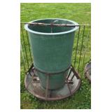 42-in tall fiberglass round hog feeder.