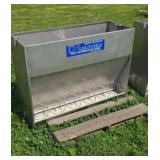 42"W X 29 1/2" T stainless steel sow feeder.