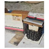 Spool of new chainsaw chain