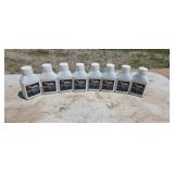 Eight bottles of two-cycle oil