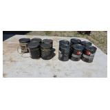 11 cans of 2-cycle oil