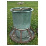 41 Inch Tall round fiberglass hog feeder.