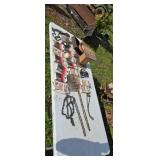 Table full of new chainsaw chains